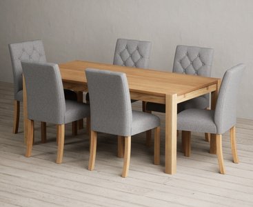 View Thetford 180cm oak dining table with 8 grey isabella chairs View Thetford 180cm oak dining table with 8 grey isabella chairs