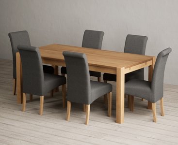 View Thetford 180cm solid oak dining table with 6 charcoal grey scroll back chairs View Thetford 180cm solid oak dining table with 6 charcoal grey scroll back chairs
