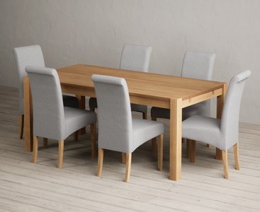 View Thetford 180cm solid oak dining table with 6 grey scroll back chairs View Thetford 180cm solid oak dining table with 6 grey scroll back chairs