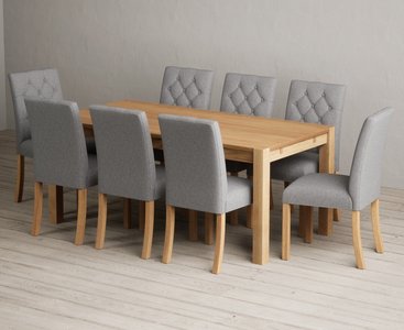 View Thetford 180cm solid oak dining table with 8 grey isabella chairs View Thetford 180cm solid oak dining table with 8 grey isabella chairs