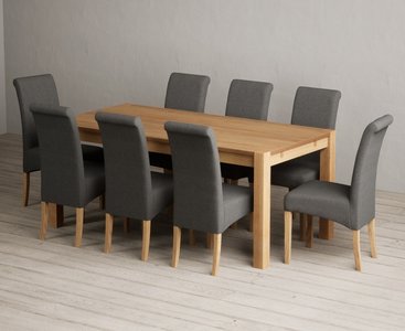 View Thetford 180cm solid oak dining table with 8 charcoal grey scroll back chairs View Thetford 180cm solid oak dining table with 8 charcoal grey scroll back chairs