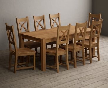 View Thetford 180cm solid oak dining table with 10 oak natural chairs View Thetford 180cm solid oak dining table with 10 oak natural chairs