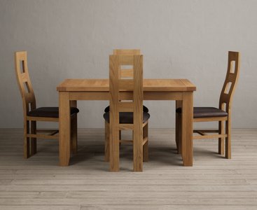 View Extending yateley 130cm solid oak dining table with 4 brown natural chairs View Extending yateley 130cm solid oak dining table with 4 brown natural chairs