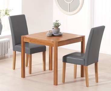 View York 80cm solid oak dining table with 2 black olivia chairs View York 80cm solid oak dining table with 2 black olivia chairs