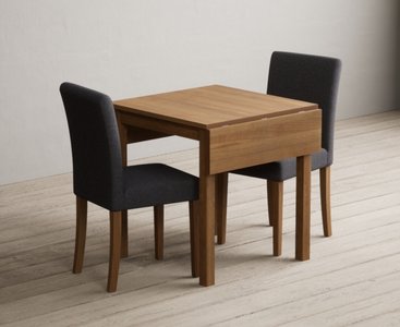 View Extending york 70cm solid oak drop leaf dining table with 2 charcoal lila chairs View Extending york 70cm solid oak drop leaf dining table with 2 charcoal lila chairs