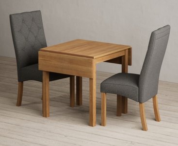 View Extending york 70cm solid oak drop leaf dining table with 2 grey maya chairs View Extending york 70cm solid oak drop leaf dining table with 2 grey maya chairs