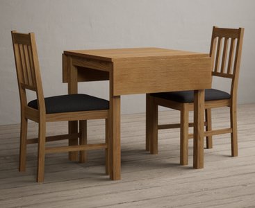 Photo of extending york 70cm solid oak dining table with 2 charcoal grey york chairs