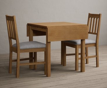 View Extending york 70cm solid oak dining table with 2 light grey york chairs View Extending york 70cm solid oak dining table with 2 light grey york chairs