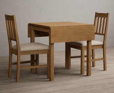 View Extending york 70cm solid oak dining table with 4 linen york chairs View Extending york 70cm solid oak dining table with 4 linen york chairs