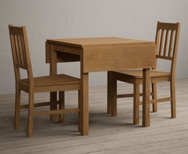 View Extending york 70cm solid oak dining table with 4 oak york chairs View Extending york 70cm solid oak dining table with 4 oak york chairs