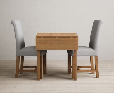 View Extending york 70cm solid oak dining table with 2 grey braced chairs View Extending york 70cm solid oak dining table with 2 grey braced chairs