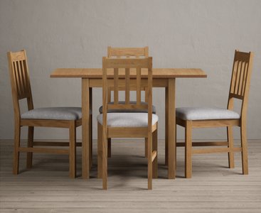 View Extending york 70cm solid oak drop leaf dining table with 2 light grey york chairs View Extending york 70cm solid oak drop leaf dining table with 2 light grey york chairs