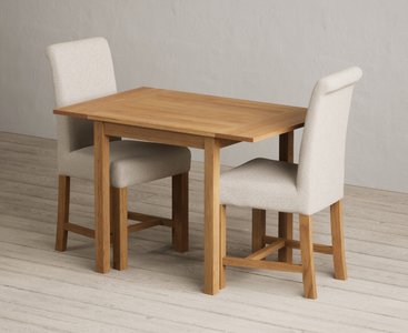 View Extending york 70cm solid oak drop leaf dining table with 2 natural braced chairs View Extending york 70cm solid oak drop leaf dining table with 2 natural braced chairs