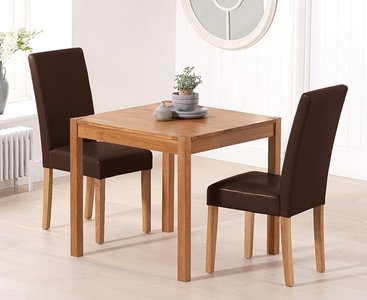 View York 80cm solid oak dining table with 2 black olivia chairs View York 80cm solid oak dining table with 2 black olivia chairs