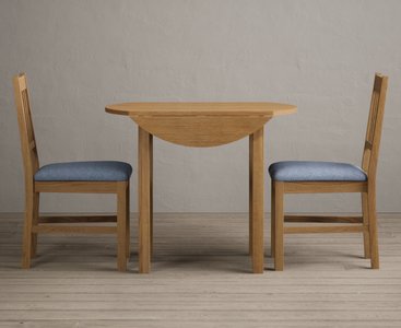 Photo of extending york 90cm solid oak dining table with 2 blue york chairs