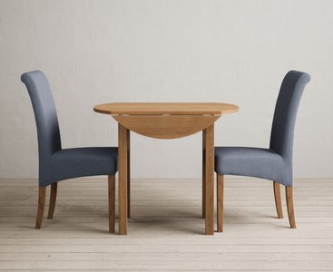View Extending york 90cm solid oak dining table with 2 blue scroll back chairs View Extending york 90cm solid oak dining table with 2 blue scroll back chairs