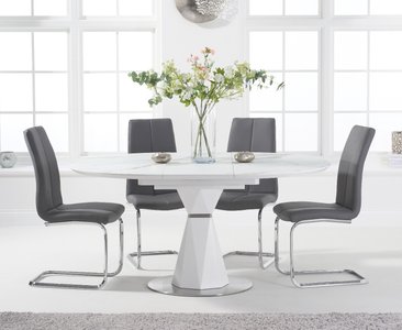 View Venosa 120cm round white dining table with 6 grey gianni chairs View Venosa 120cm round white dining table with 6 grey gianni chairs
