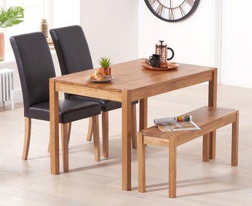 View York 120cm solid oak dining table with 2 black olivia chairs with 2 oak benches View York 120cm solid oak dining table with 2 black olivia chairs with 2 oak benches