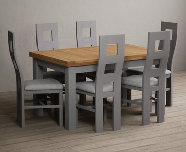 View Extending buxton 140cm oak and light grey painted dining table with 8 charcoal grey painted chairs View Extending buxton 140cm oak and light grey painted dining table with 8 charcoal grey painted chairs