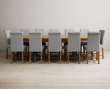 View Extending olympia 180cm oak and light grey painted dining table with 12 grey scroll back chairs View Extending olympia 180cm oak and light grey painted dining table with 12 grey scroll back chairs