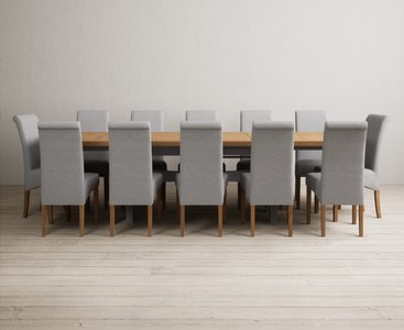 View Extending olympia 180cm oak and light grey painted dining table with 12 grey scroll back chairs View Extending olympia 180cm oak and light grey painted dining table with 12 grey scroll back chairs