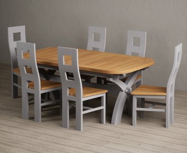 View Extending olympia 180cm oak and light grey painted dining table with 8 charcoal grey painted chairs View Extending olympia 180cm oak and light grey painted dining table with 8 charcoal grey painted chairs