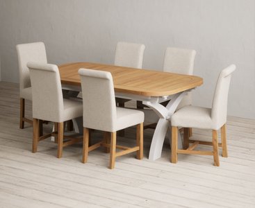View Extending olympia 180cm oak and soft white painted dining table with 12 brown scroll back chairs View Extending olympia 180cm oak and soft white painted dining table with 12 brown scroll back chairs