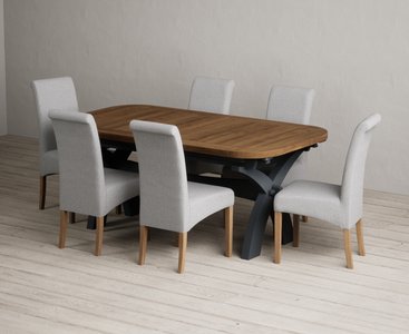 View Extending olympia 180cm oak and dark blue painted dining table with 10 blue scroll back chairs View Extending olympia 180cm oak and dark blue painted dining table with 10 blue scroll back chairs