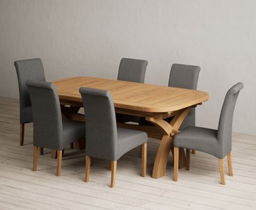 View Extending olympia 180cm solid oak dining table with 10 grey scroll back chairs View Extending olympia 180cm solid oak dining table with 10 grey scroll back chairs