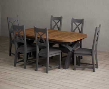 View Extending olympia 180cm oak and charcoal grey painted dining table with 12 light grey painted chairs View Extending olympia 180cm oak and charcoal grey painted dining table with 12 light grey painted chairs