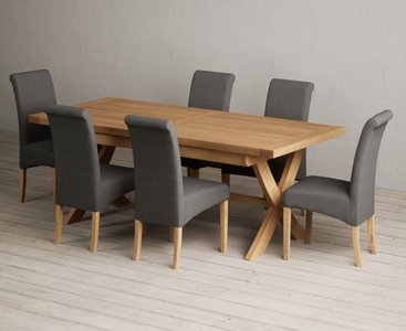 View Extending buckley 200cm solid oak dining table with 10 grey scroll back chairs View Extending buckley 200cm solid oak dining table with 10 grey scroll back chairs