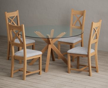 View Lakelyn 140cm round solid oak and glass dining table with 4 light grey natural solid oak chairs View Lakelyn 140cm round solid oak and glass dining table with 4 light grey natural solid oak chairs