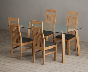 View Lakelyn 180cm solid oak and glass dining table with 4 oak monroe chairs View Lakelyn 180cm solid oak and glass dining table with 4 oak monroe chairs