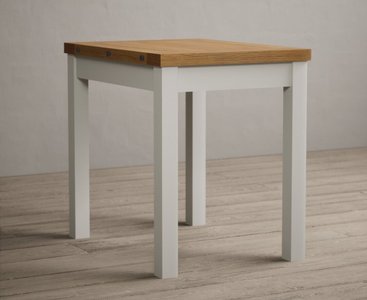 View Extending hadleigh oak and signal white painted dining table View Extending hadleigh oak and signal white painted dining table