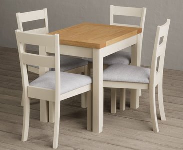 View Extending hadleigh oak and cream painted dining table with 2 blue kendal chairs View Extending hadleigh oak and cream painted dining table with 2 blue kendal chairs