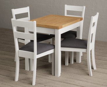 View Extending hadleigh oak and signal white painted dining table with 2 blue kendal chairs View Extending hadleigh oak and signal white painted dining table with 2 blue kendal chairs