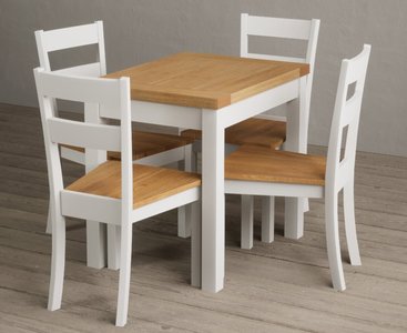 View Extending hadleigh oak and signal white painted dining table with 2 blue kendal chairs View Extending hadleigh oak and signal white painted dining table with 2 blue kendal chairs