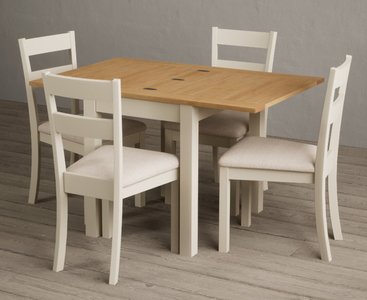 View Extending hadleigh oak and cream painted dining table with 2 blue kendal chairs View Extending hadleigh oak and cream painted dining table with 2 blue kendal chairs