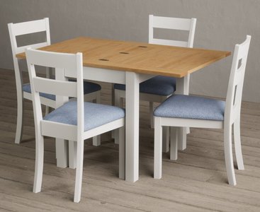 View Extending hadleigh oak and signal white painted dining table with 2 blue kendal chairs View Extending hadleigh oak and signal white painted dining table with 2 blue kendal chairs