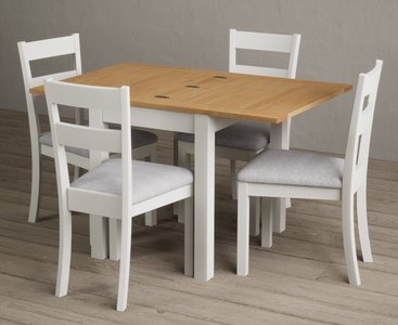 View Extending hadleigh oak and signal white painted dining table with 2 blue kendal chairs View Extending hadleigh oak and signal white painted dining table with 2 blue kendal chairs