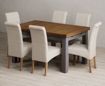 View Extending buxton 140cm oak and charcoal grey painted dining table with 8 grey scroll back chairs View Extending buxton 140cm oak and charcoal grey painted dining table with 8 grey scroll back chairs
