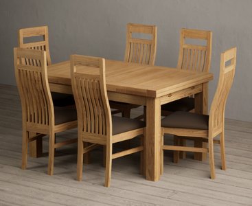 View Extending buxton 140cm solid oak dining table with 8 black chairs View Extending buxton 140cm solid oak dining table with 8 black chairs