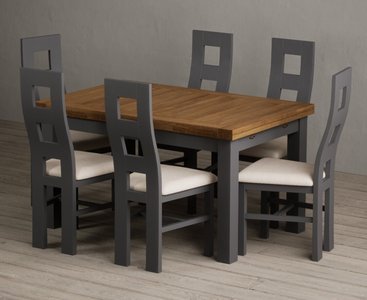 View Extending buxton 140cm oak and charcoal grey painted dining table with 8 light grey painted chairs View Extending buxton 140cm oak and charcoal grey painted dining table with 8 light grey painted chairs