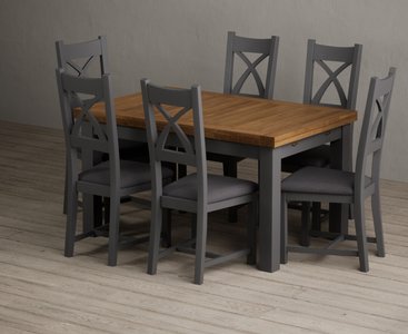 View Extending buxton 140cm oak and charcoal grey painted dining table with 8 light grey painted chairs View Extending buxton 140cm oak and charcoal grey painted dining table with 8 light grey painted chairs