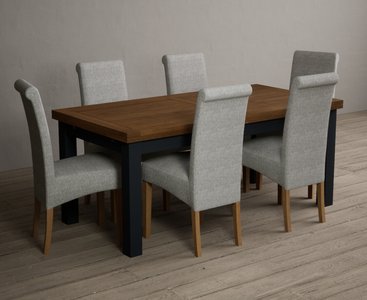 View Extending buxton 180cm oak and dark blue painted dining table with 10 brown scroll back chairs View Extending buxton 180cm oak and dark blue painted dining table with 10 brown scroll back chairs