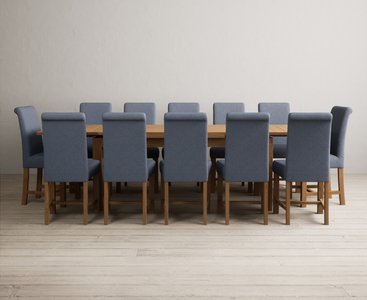 View Extending buxton 180cm solid oak dining table with 12 brown scroll back chairs View Extending buxton 180cm solid oak dining table with 12 brown scroll back chairs