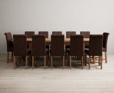 View Extending buxton 180cm solid oak dining table with 12 blue scroll back chairs View Extending buxton 180cm solid oak dining table with 12 blue scroll back chairs
