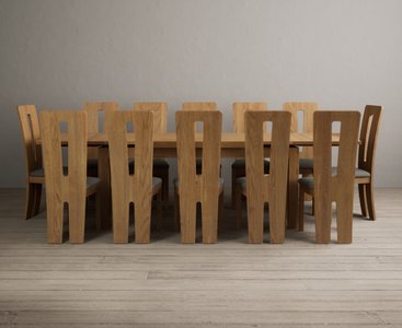 View Extending buxton 180cm solid oak dining table with 12 cream lucca chairs View Extending buxton 180cm solid oak dining table with 12 cream lucca chairs