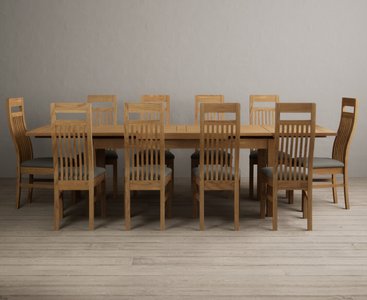 View Extending buxton 180cm solid oak dining table with 12 cream chairs View Extending buxton 180cm solid oak dining table with 12 cream chairs