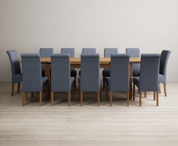 View Extending buxton 180cm solid oak dining table with 12 brown scroll back chairs View Extending buxton 180cm solid oak dining table with 12 brown scroll back chairs